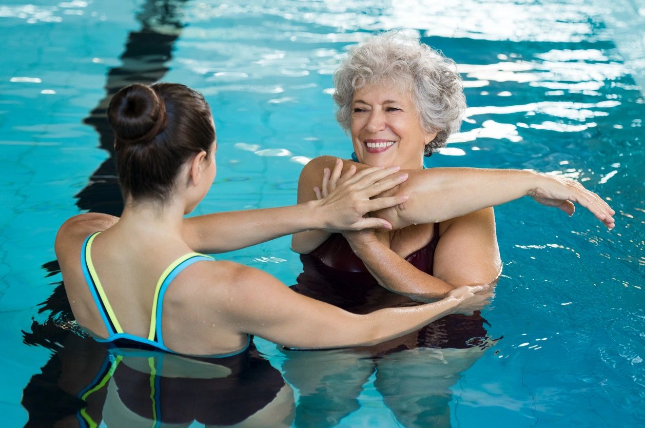 Women doing pool exercise aquatic therapy